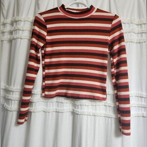 Caution to the wind. Size small.